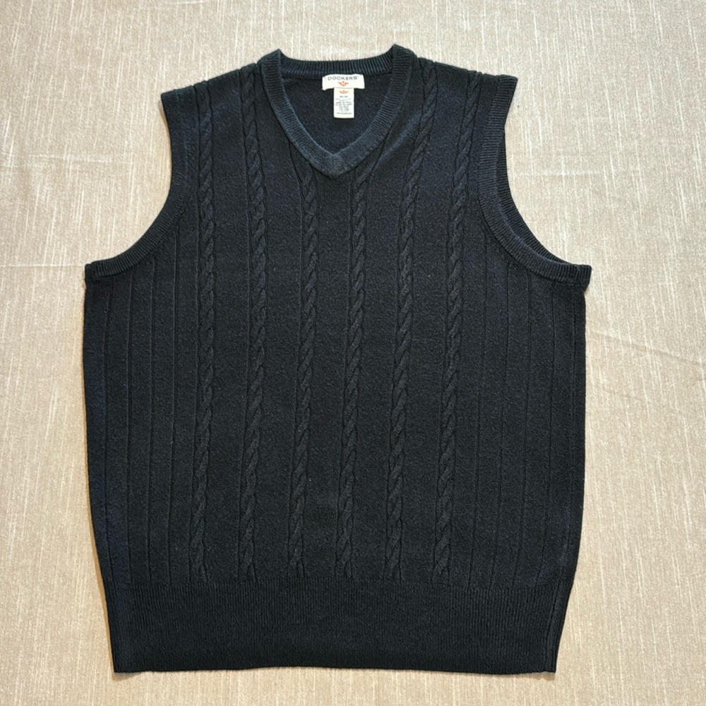 Dockers Men’s black v-neck sweater vest. 

Size Medium